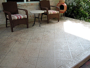 The TerraStone overlay is ideal for resurfacing a dull, weathered concrete patio. 